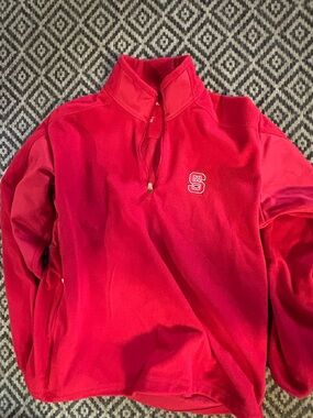 Antigua Men’s Red Quarter-Zip Fleece Pullover with NC State Logo